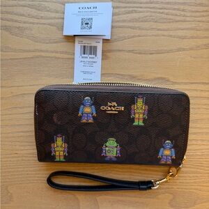 Coach Brown Wristlet with Vibrant Robot Pattern